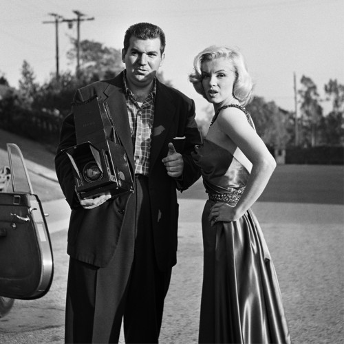 Marilyn Monroe Standing with Photographer