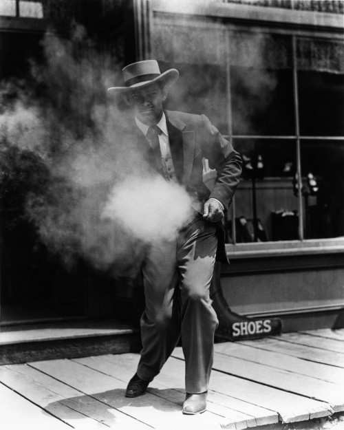 Portrait of Clark Gable Standing on Sidewalk