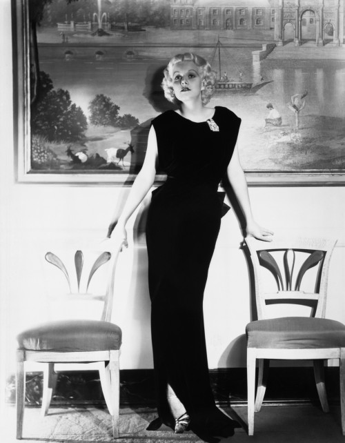 Jean Harlow Posing in Front of Wall