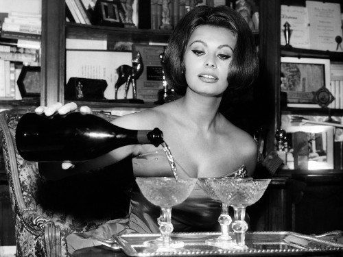 Sophia Loren Pouring Champagne in Glasses