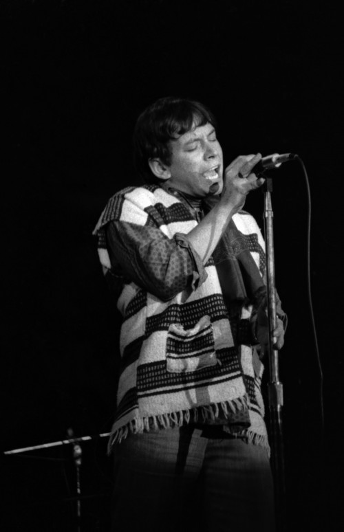 Eric Burdon in Profile Shot with Microphone in Hand